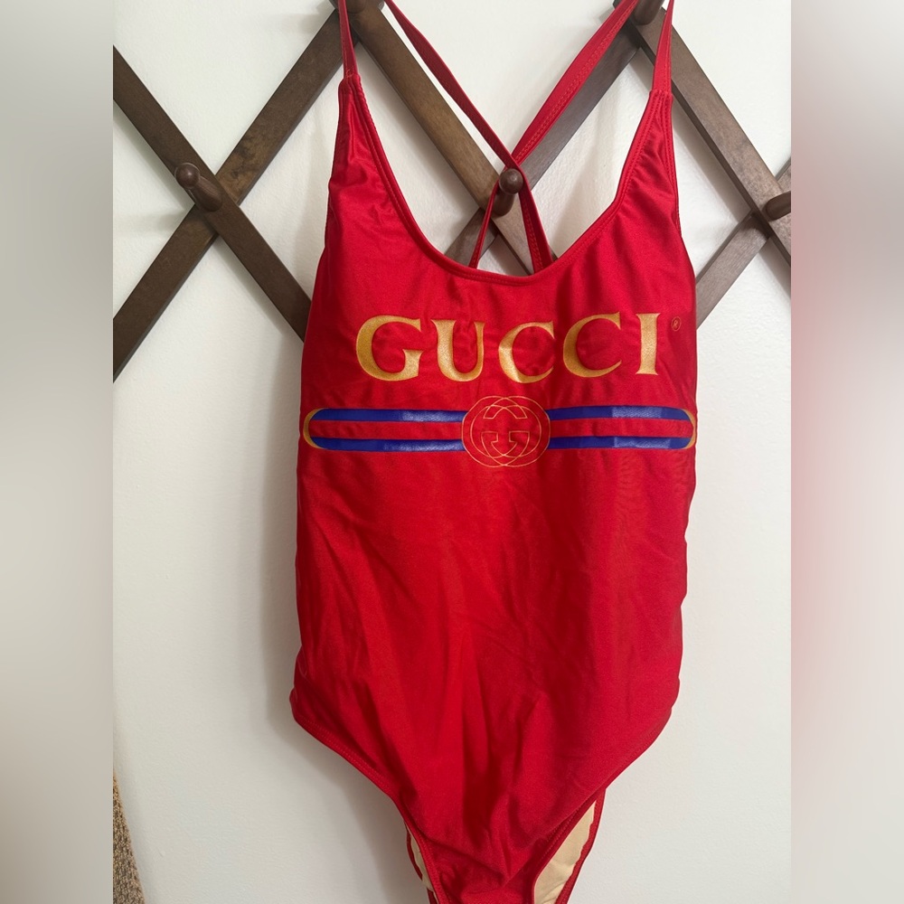 Gucci Red One-Piece with Gold and Blue Accents